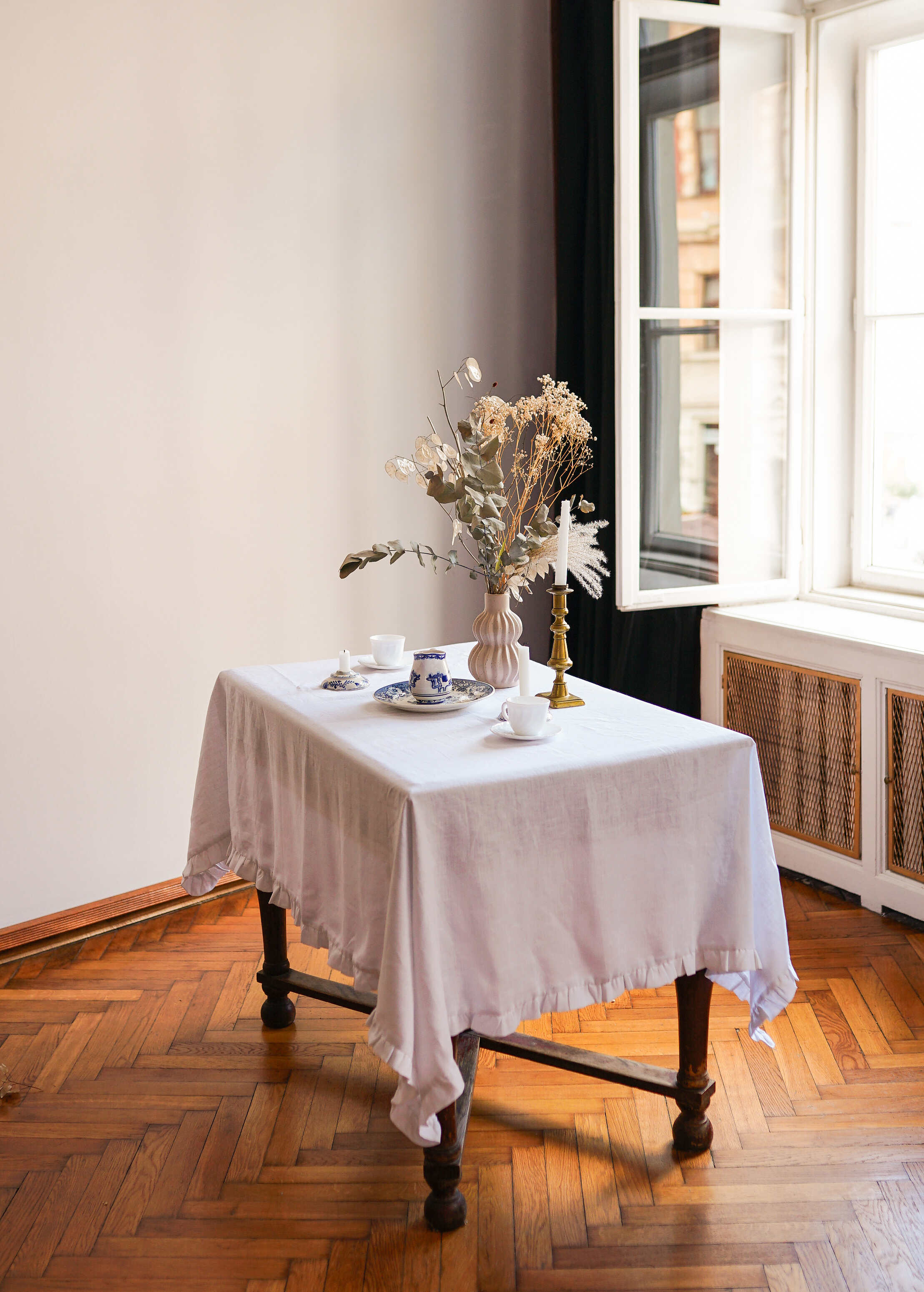 a table with a vase of flowers on it