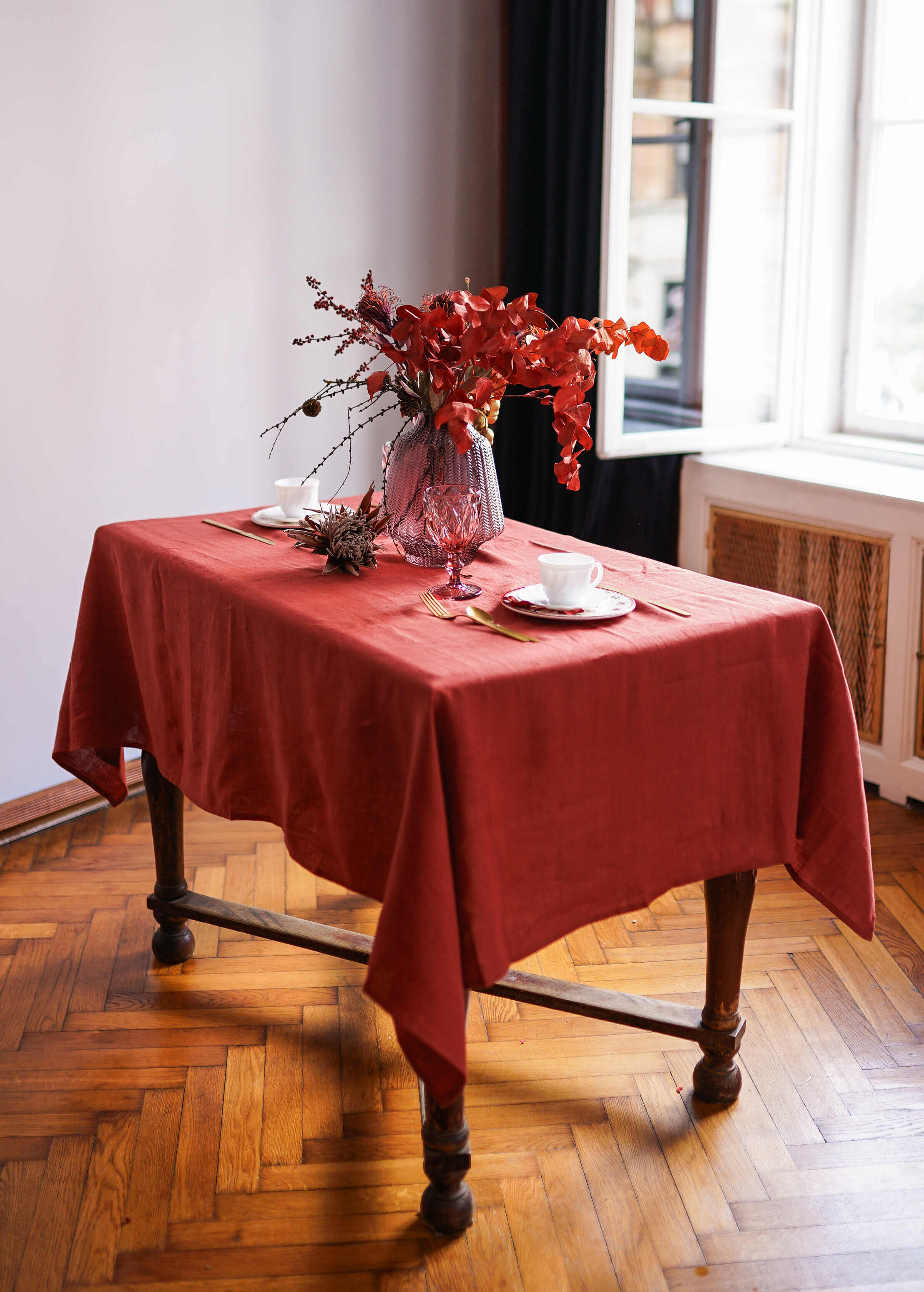 a table with a red table cloth on it