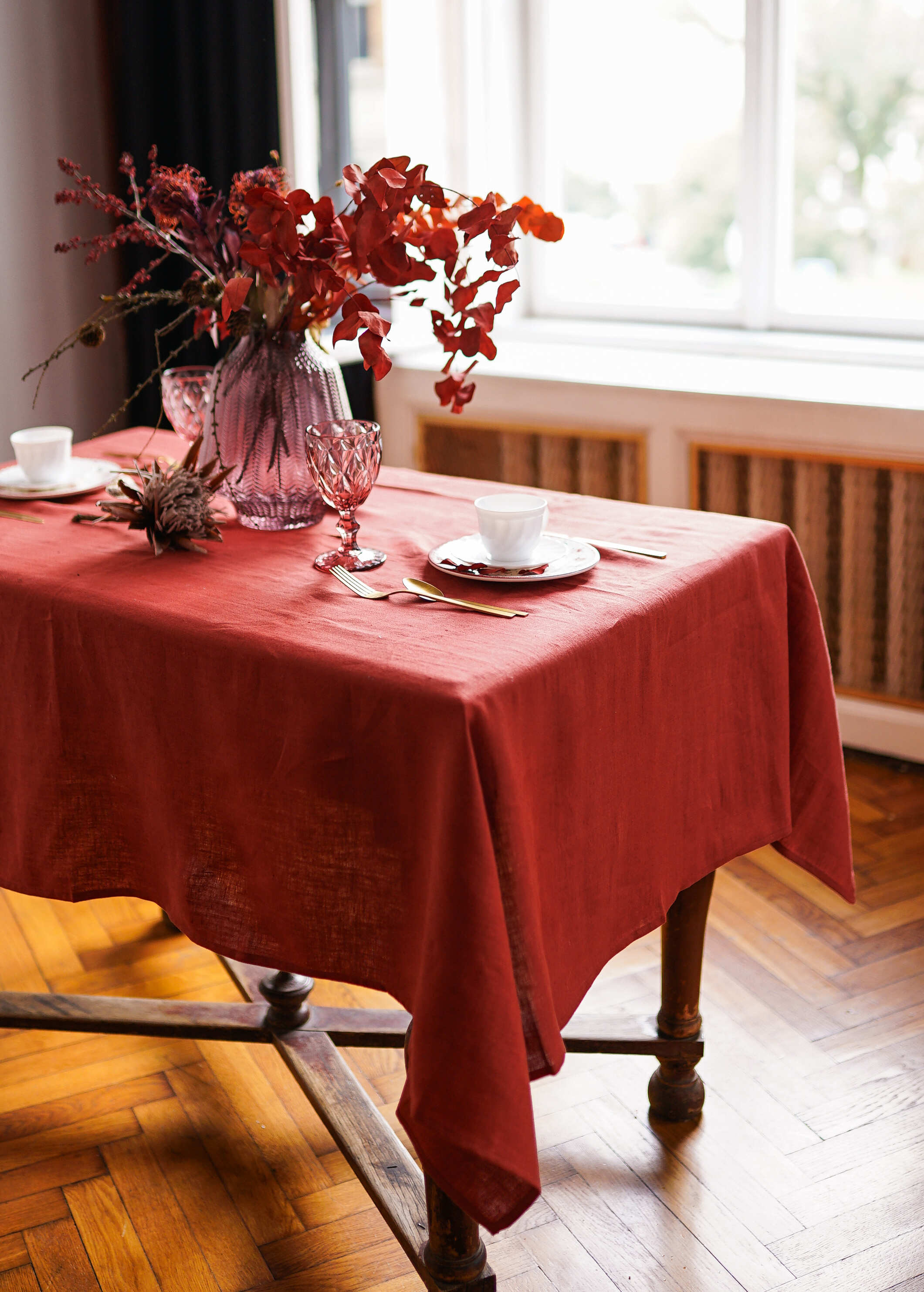 a table with a red table cloth on it