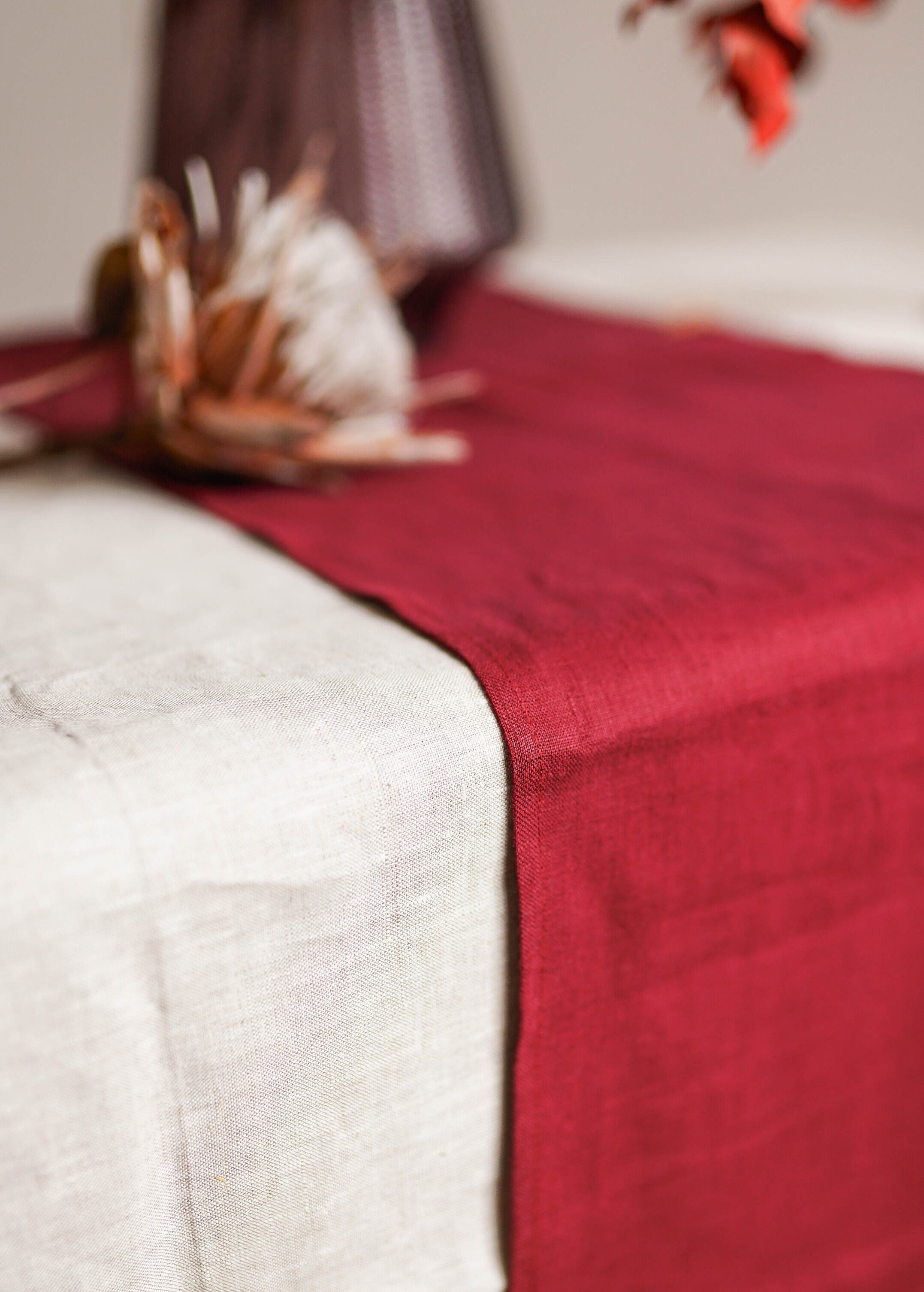 a close up of a table with a red table cloth