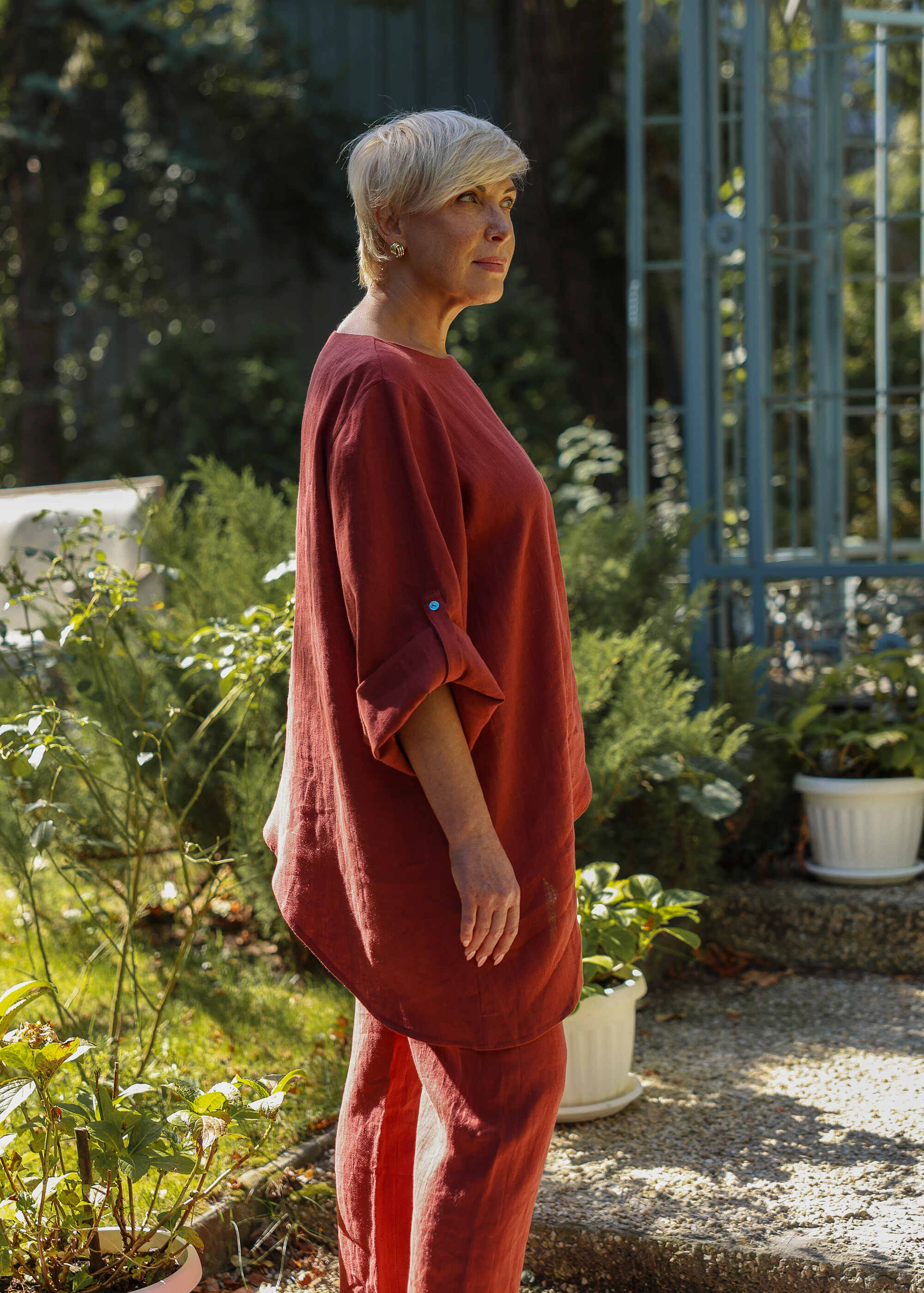 a woman in a red shirt and red pants