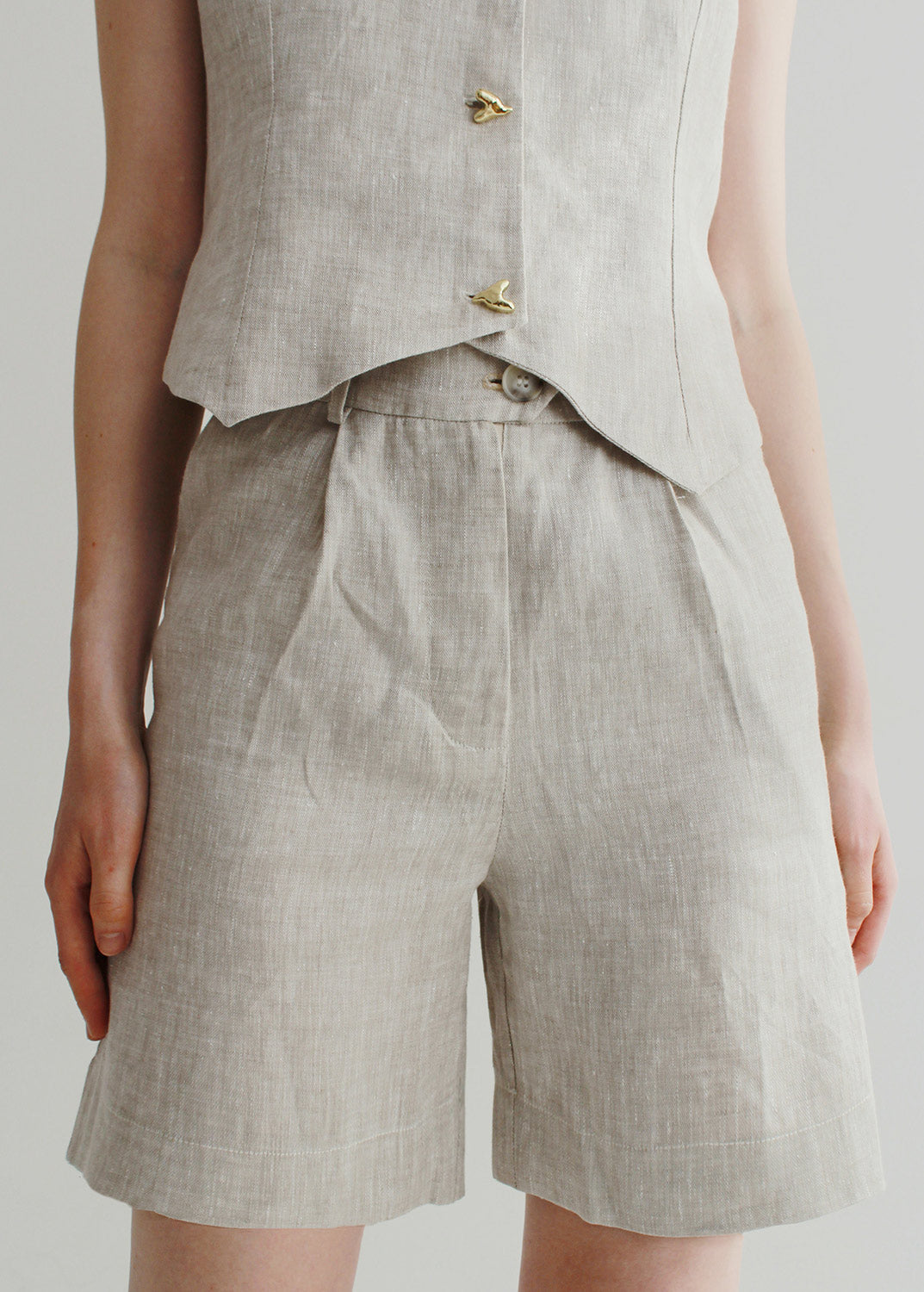 Set of beige linen shorts and waistcoat