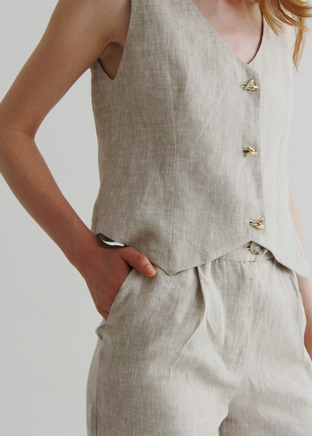 Set of beige linen shorts and waistcoat