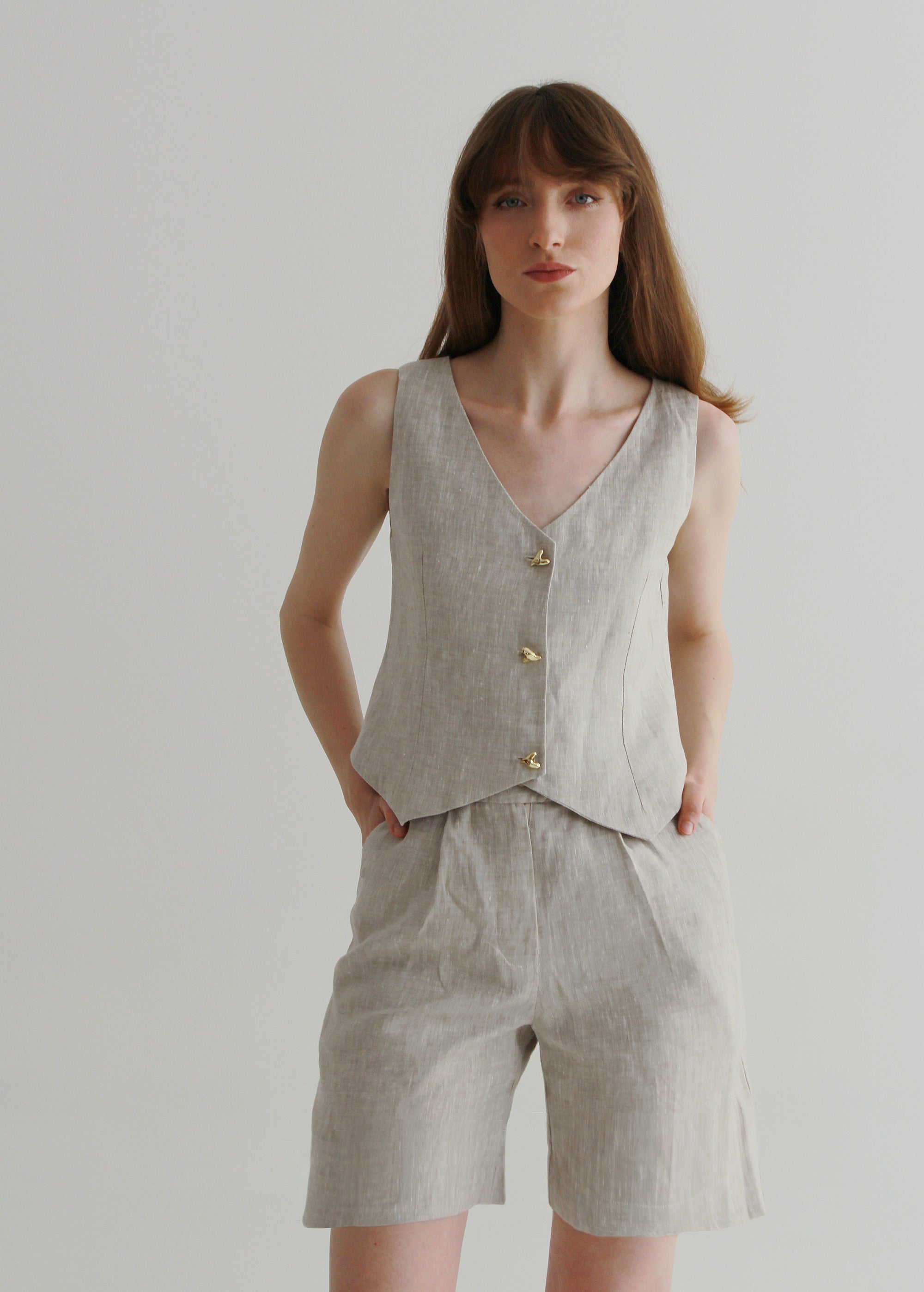 Set of beige linen shorts and waistcoat